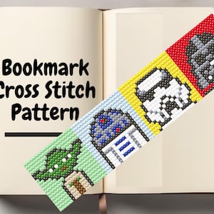 May include: A rectangular bookmark featuring a cross stitch pattern of four characters arranged in a vertical row. The design includes a green character, a blue and white robot, a white helmeted figure, and a black helmeted figure on a red background.