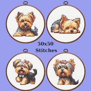 May include: Four cross-stitch embroidery hoops featuring Yorkshire Terrier puppies. Each puppy is depicted in a different pose, with brown, black, and tan fur. The text "50x50 Stitches" is displayed between the top and bottom pairs of hoops.
