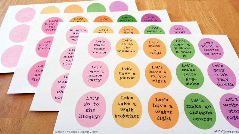 May include: A set of colorful printable activity ideas for kids. The circles feature phrases like "Let's play in the water", "Let's make some music", "Let's go to the library", and "Let's have a water fight".