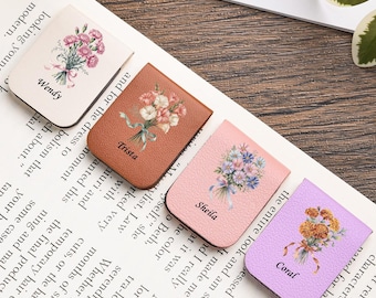 May include: Four leather bookmarks with floral designs and names: Wendy, Trista, Sheila, and Coral. Each bookmark features a different color background and a unique flower bouquet illustration.