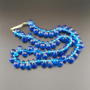 Vintage Blue Glass Beaded Necklace with Gold Color Accents 20in | 12.9mm