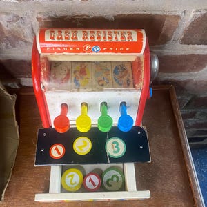 Vintage 1963 Fisher-Price Wooden Toy Cash Register with coins