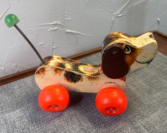 1960s Fisher Price WOODEN LITTLE SNOOPY Wobbler Squeaky Sound Pull Toy
