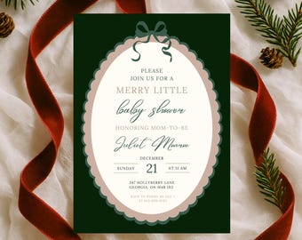 May include: A baby shower invitation with a dark green background and a decorative oval frame. The invitation text reads "Merry Little Baby Shower" and includes the name "Juliet Monroe" and event details. A red ribbon and pine sprigs decorate the background.