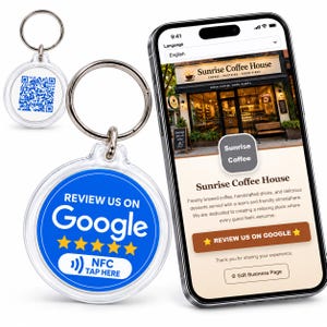 May include: Two round clear acrylic keychains with metal rings. One keychain displays a blue QR code. The other features a blue circular insert with the text "REVIEW US ON Google", five yellow stars, and "NFC TAP HERE". A smartphone shows a business page.