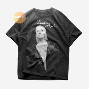 クリスティーナ・アギレラ　Tシャツ　Lサイズ Christina Aguilera Graphic Tee | Urban Outfitters