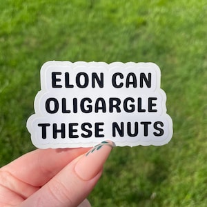 Puede incluir: Pegatina blanca con texto negro que dice "Elon puede oligarglar estas nueces".