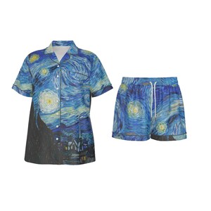 May include: A pajama set featuring a short-sleeved button-down shirt and matching shorts. The set is adorned with a print of Van Gogh's "Starry Night" painting, showcasing swirling blues, yellows, and dark accents. The shorts have a white drawstring.