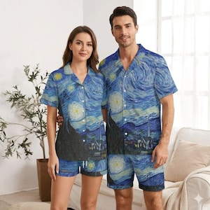 May include: Matching pajama sets featuring a print of Van Gogh's "Starry Night" painting. The sets include a short-sleeved button-down shirt and shorts. The color palette is dominated by blues, yellows, and blacks, with a swirling, textured appearance.