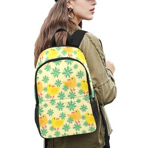Sac à dos en tissu à motif floral vert et canard | Poches latérales en filet