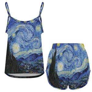 May include: A white ceramic mug with a black handle and the text "But First, Coffee" in a bold, black font. The mug is set against a neutral background, highlighting its simple design.