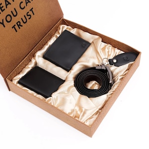 Set de regalo de cuero negro premium para hombre: billetera, tarjetero, cinturón y llavero en una elegante caja de regalo. Perfecto para cualquier ocasión.