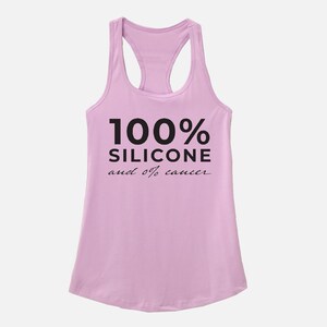 May include: A pink tank top with the text "100% Silicone and 0% cancer" printed on the front.