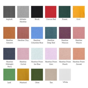 Pode incluir: Uma tabela com 20 amostras de tecido de diferentes cores. As cores incluem asfalto, heather atl&eacute;tico, preto, vermelho de lona, floresta, ouro, heather outono, heather argila, heather azul Columbia, heather azul-petr&oacute;leo, heather marrom, heather malva, heather azul-marinho, heather orqu&iacute;dea, heather azul gelo, heather lil&aacute;s, heather p&ecirc;ssego, heather p&ocirc;r do sol, folha, mostarda, oliva, bronzeado e branco.