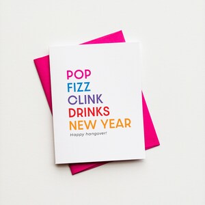 Carte de célébration de bonne année drôle et lumineuse - carte de gueule de bois - carte de champagne - carte pop, pétillant, clic, boisson