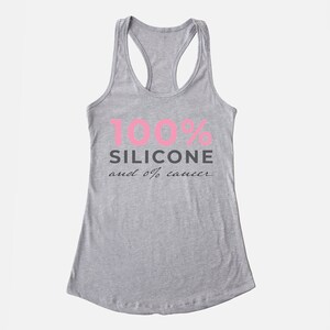 May include: Gray tank top with the text "100% Silicone and 0% cancer" in pink and black lettering.