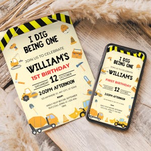 May include: A birthday invitation and a smartphone displaying the same design. The invitation is light yellow with construction-themed illustrations and text: "I DIG BEING ONE" and "WILLIAM'S 1ST BIRTHDAY". The phone shows the same design.