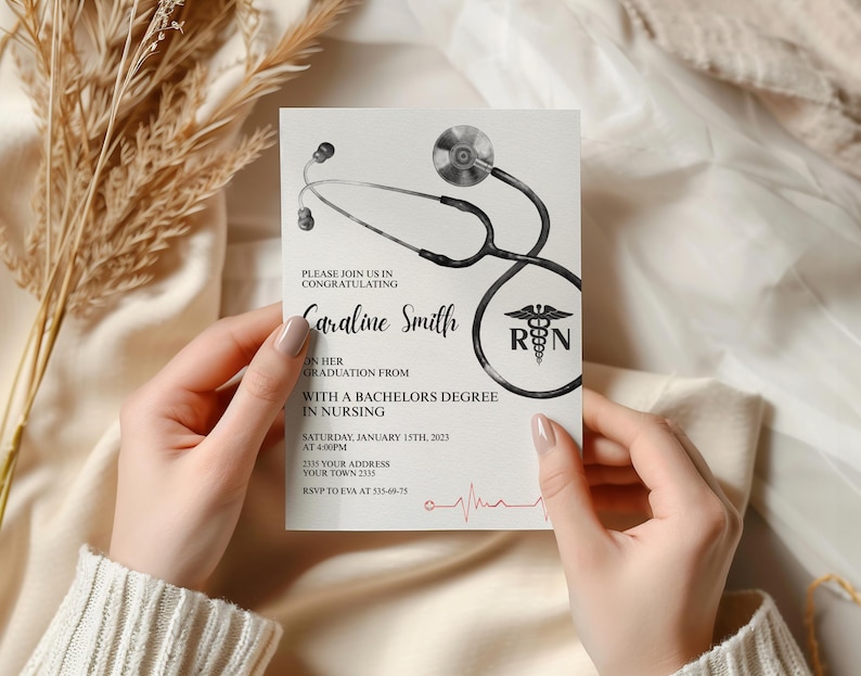 May include: A graduation announcement card held by hands. The card features a stethoscope illustration and the text "Caraline Smith" with details about her Bachelor's degree in Nursing, including the date, time, and location of the event.