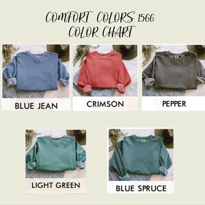 Elevate your style with this Custom Comfort Colors Mama Est Sweatshirt, a perfect blend of comfort and elegance. Designed with a Chinoiserie Blue Toile De Jouy pattern, this Coquette Bow Sweatshirt brings a timeless and feminine touch to any outfit. Whether you're looking for a girly aesthetic crewneck or a unique Mother's Day Gift, this Comfort Colors 1566 sweatshirt is a stylish and meaningful choice for moms.
Featuring a blue ribbon sweater design, this ribbon sweatshirt is inspired