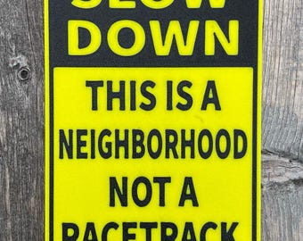 Slow Down This Is A Neighborhood Sign Funny Dad Joke Gas Sign In Vibrant Yellow With Black Lettering Indoor Outdoor Mini Signs Customizable