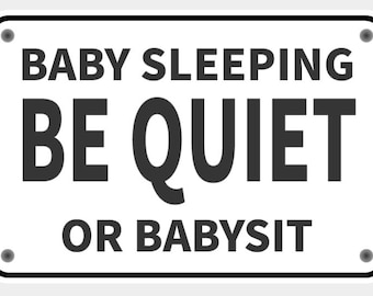 May include: A rectangular white sign with a black border and the text "BABY SLEEPING BE QUIET OR BABYSIT" in bold black letters. The sign has four silver rivets in each corner.