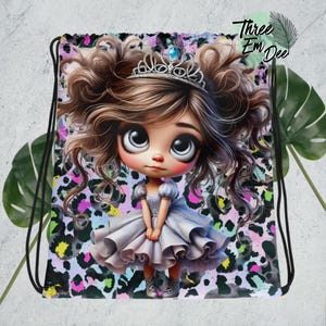 May include: A drawstring bag with a colorful leopard print background. A cartoon girl with large eyes, brown hair, and a crown is wearing a light blue dress. The text "Three Em Dee" is in the upper right corner of the bag.