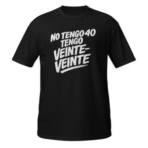 May include: Black t-shirt with white text that reads "NO TENGO 40 TENGO VEINTE-VEINTE". The text is in a bold, handwritten style. The shirt has short sleeves and a crew neck.