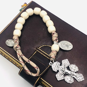 Denarius with the Cross of Forgiveness and wooden beads