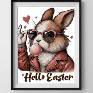 Puede incluir: Un conejito de dibujos animados con gafas de sol rojas y una chaqueta de cuero roja sopla una burbuja rosa. El conejito tiene pelo marrón y mira hacia la derecha. El texto "Hello Easter" está escrito debajo del conejito.