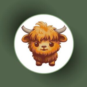 May include: A cartoon illustration of a brown and orange fluffy yak with large eyes and a friendly expression.