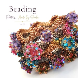 May include: A beaded bracelet featuring a complex woven structure of metallic bronze seed beads interspersed with clusters of multi-colored faceted crystals in shades of purple, pink, blue, and green. Text reads Beading Pattern Made by Shila No. 33.