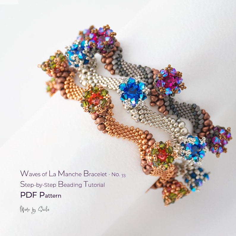 May include: Three wavy beaded bracelets featuring metallic bronze, silver, and dark grey seed beads accented with vibrant multi-colored crystal clusters. Text reads: Waves of La Manche Bracelet No. 33 Step-by-Step Beading Tutorial PDF Pattern Made by Shala.