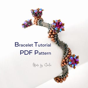 May include: A beaded bracelet featuring a wavy design in matte grey and metallic copper beads, accented with clusters of iridescent fuchsia and blue crystals. The text "Bracelet Tutorial PDF Pattern" and "Made by Shila" is visible.