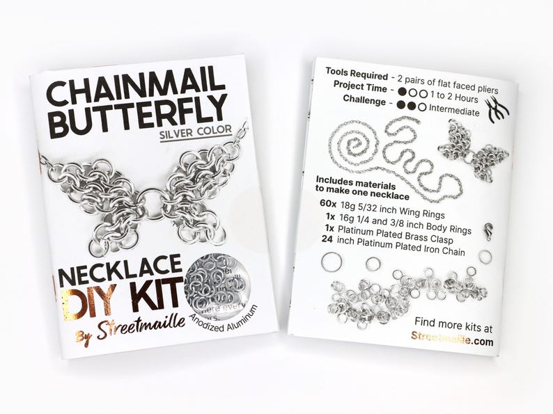 A photo showing the front and back of the silver version of this DIY kit. The front shows a finished butterfly and the material of the jump rings included, anodized aluminum. The back of the booklet shows the project will take 1 to 2 hours and requires two pairs of flat faced pliers (not included). The challenge level for this project is intermediate due to the small nature of the rings.