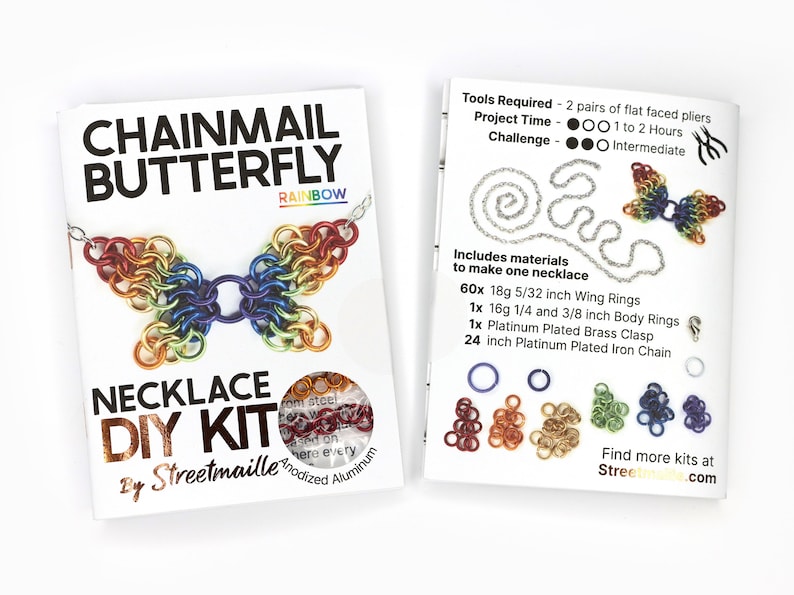 A photo showing the front and back of the rainbow version of this DIY kit. The front shows a finished butterfly and the material of the jump rings included, anodized aluminum. The back of the booklet shows the project will take 1 to 2 hours and requires two pairs of flat faced pliers (not included). The challenge level for this project is intermediate due to the small nature of the rings.