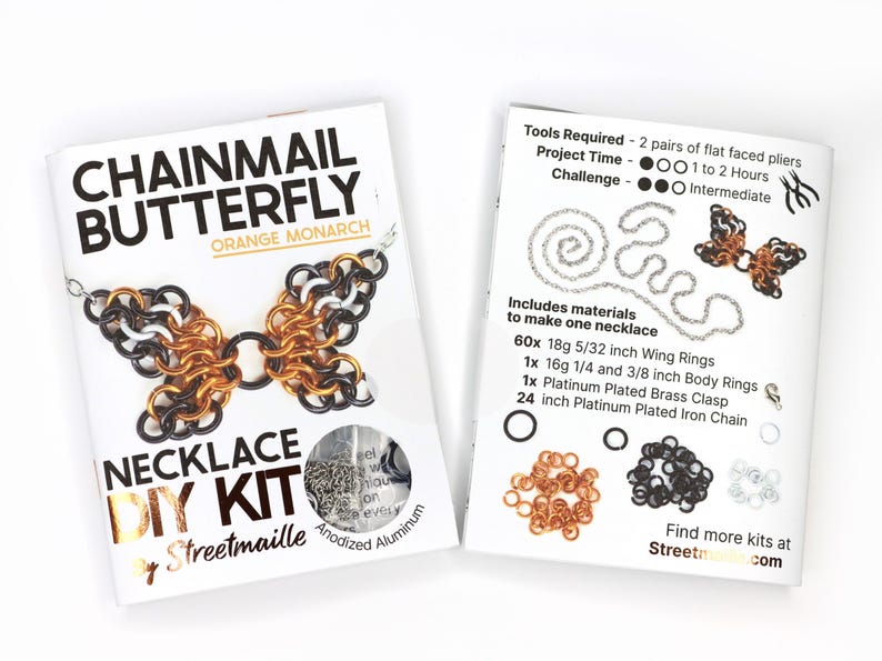 A photo showing the front and back of the orange monarch version of this DIY kit. The front shows a finished butterfly and the material of the jump rings included, anodized aluminum. The back of the booklet shows the project will take 1 to 2 hours and requires two pairs of flat faced pliers (not included). The challenge level for this project is intermediate due to the small nature of the rings.