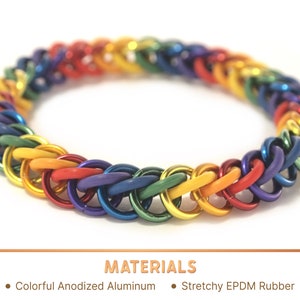 A rainbow colored chainmail bracelet made of colorful anodized aluminum and stretchy EPDM rubber.