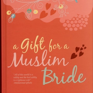 May include: A book cover with a pink and white floral design and the title "a Gift for a Muslim Bride". The cover also includes a quote from Muhammad (pbuh) and the author's name, Muhammad Haneef Abdul Majeed.