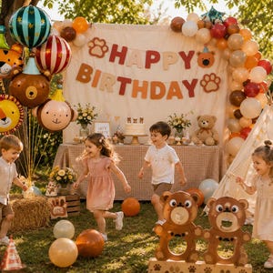 May include: A festive outdoor birthday party scene with children playing. Colorful balloons shaped like animals and a "Happy Birthday" banner decorate the area. A teepee and teddy bears add to the celebratory atmosphere.