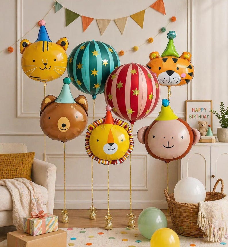 May include: A collection of animal-shaped foil balloons, including a tiger, bear, lion, and monkey, each wearing a party hat. The balloons are in various colors, such as yellow, brown, and red, and are decorated with stars and stripes. The scene includes a "Happy Birthday" sign.