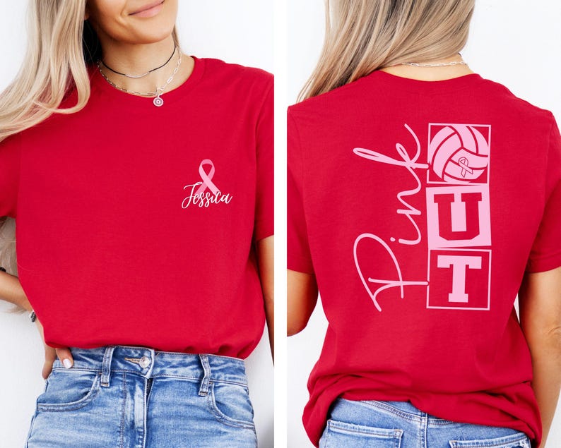 May include: Red t-shirt with a pink ribbon and the name "Jessica" printed on the front. The back of the shirt features the words "Pink Out" with a volleyball and the letters "UT" in pink. The shirt is made of a soft material.