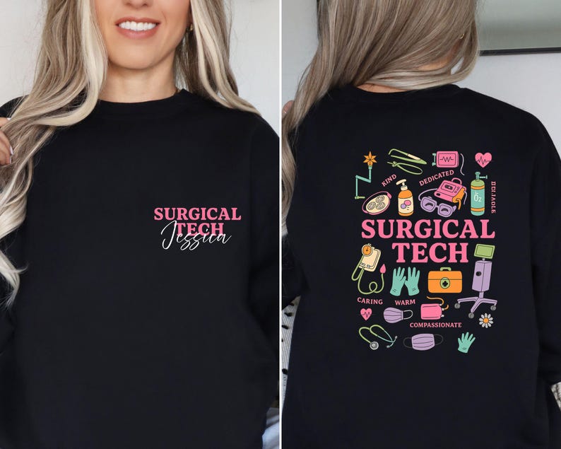May include: Black sweatshirt with the text "SURGICAL TECH Jessica" in pink script on the front. The back features a colorful graphic with medical tools, the words "SURGICAL TECH," and other medical-related words.