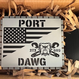 May include: A silver metal sign with a black and white American flag, a bulldog with crossed wrenches, and the text "PORT DAWG 2T2 605".