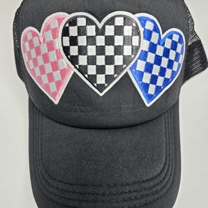 Checkered Hearts, Black Trucker Hat! Pink, Black, & Blue Checkered Hearts Patches add a Stylish look to this Snapback Hat. Cap/Fashion