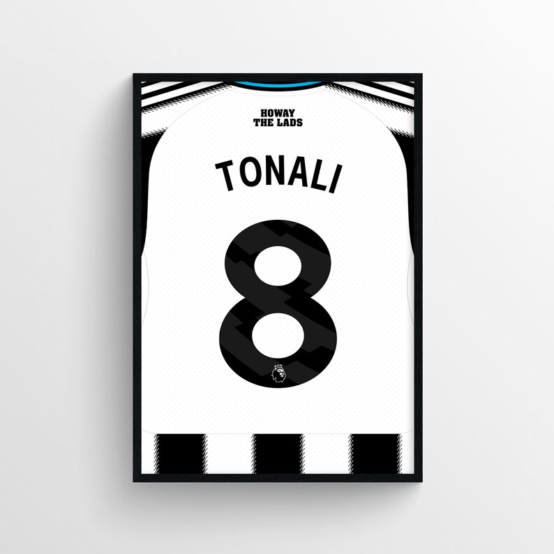 May include: Framed print of a white and black soccer jersey. The jersey features the name "TONALI" and the number "8" in black. The text "HOWAY THE LADS" is above the name. The Premier League logo is at the bottom.