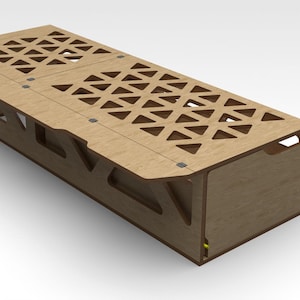 May include: A wooden storage box with a geometric pattern on the lid. The lid is open and the box is closed. The box is made of light brown wood.