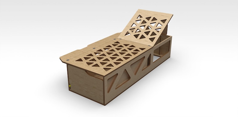 May include: A wooden storage box with a geometric pattern on the lid and sides. The lid is open and the box is sitting on a white surface.