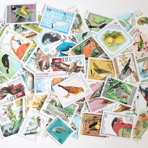 25 to 100 bird cancelled stamps