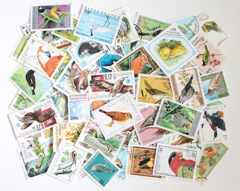 Da 25 a 100 francobolli con annullo di uccelli