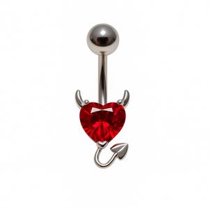 May include: A silver belly button ring featuring a red heart-shaped gem. The heart is adorned with small horns and a curved tail, forming a devilish design. The top ball and post are silver.